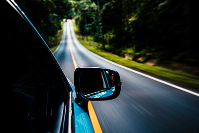 View of highway seen through car