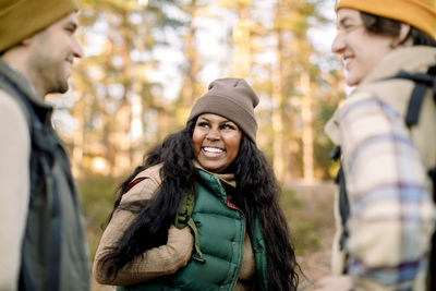 Happy woman enjoying with friends during staycation