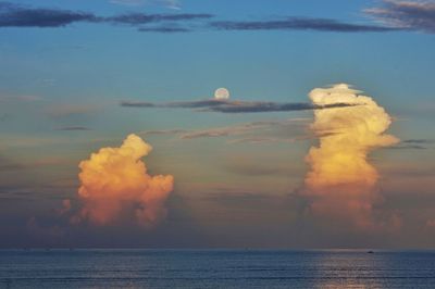 Scenic view of sea against sky at sunset