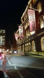 View of city lit up at night