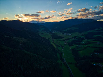 Scenic view of mountains against sky during sunset