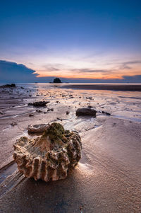 Scenic view of sea at sunset