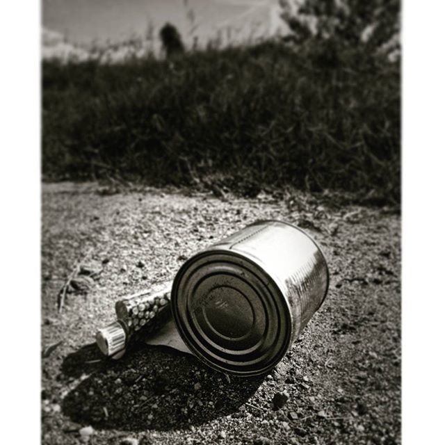 transfer print, auto post production filter, sand, beach, close-up, day, outdoors, single object, still life, abandoned, field, shore, stone - object, sunlight, nature, high angle view, no people, pebble, ground, tranquility