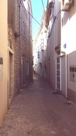 Narrow alley amidst buildings