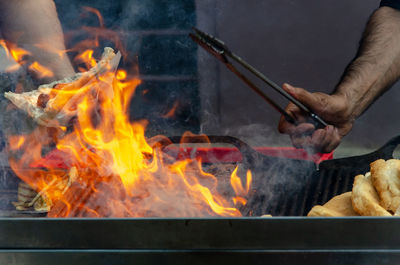 Close-up of fire on barbecue grill