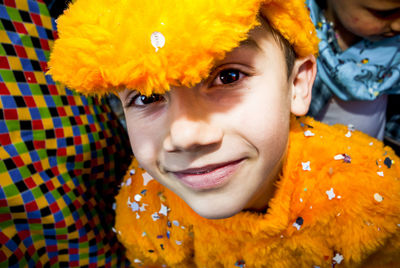 Close-up portrait of smiling boy