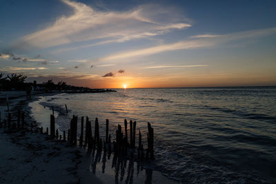 Scenic view of sea against sky during sunset