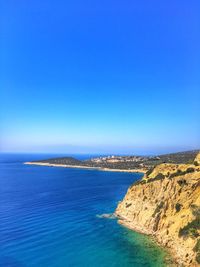 View of calm blue sea against clear sky