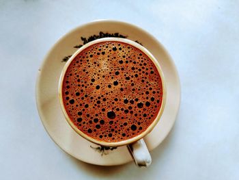 High angle view of coffee cup on table