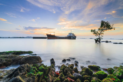 Scenic view of sea against sky during sunset