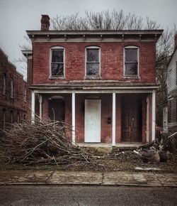 Low angle view of old building against sky