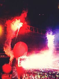 Firework display at night