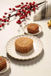 Mooncake on light background with tea. concept moon cake on mid autumn festival 