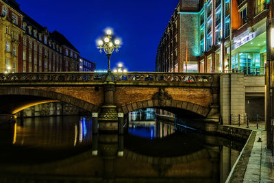 View of illuminated bridge at night