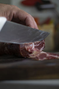 Close-up of person preparing food