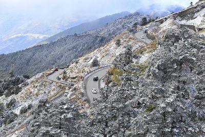 High angle view of aerial view of mountains against sky