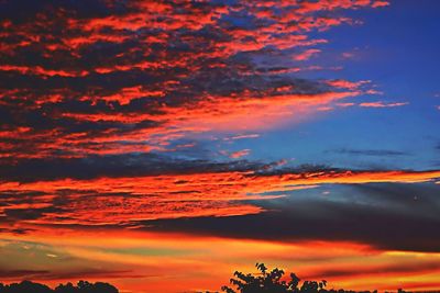 Scenic view of dramatic sky during sunset