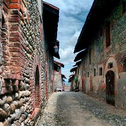 Narrow alley along buildings