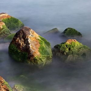 Scenic view of rocks in sea