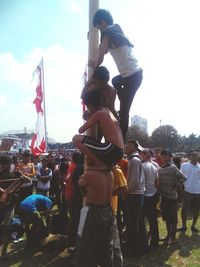 Close-up of woman standing against sky