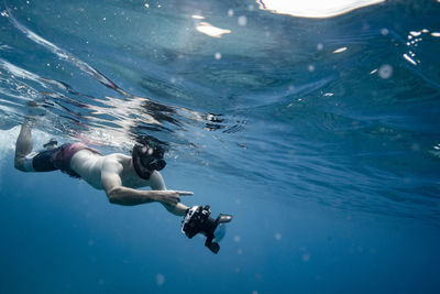 Man swimming in sea