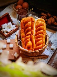 High angle view of fruits in basket on table