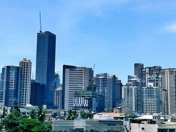 Low angle view of modern buildings against sky