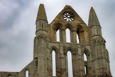 Low angle view of historic building against sky
