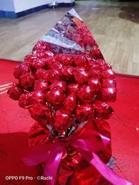 High angle view of red berries on table