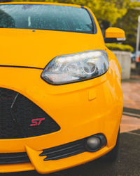 Close-up of yellow car