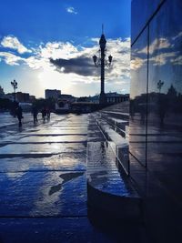 Reflection of buildings on wet street