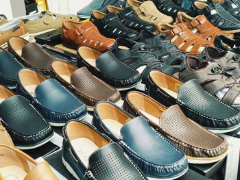 High angle view of shoes for sale at market