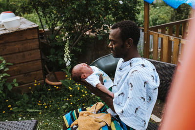 Father with newborn baby