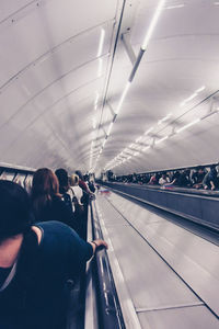 People waiting at railroad station platform