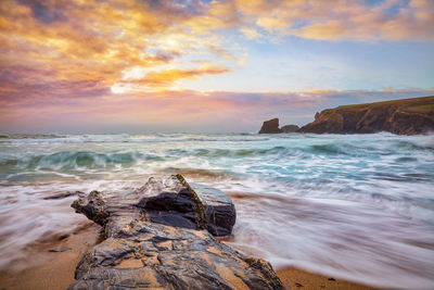 Scenic view of sea against sky during sunset