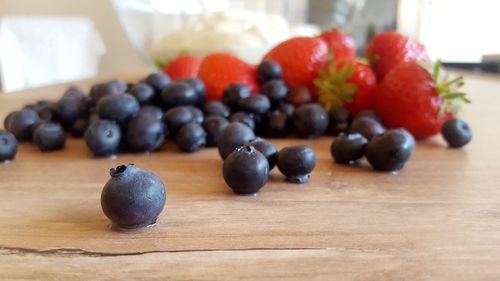 Close-up of grapes on table