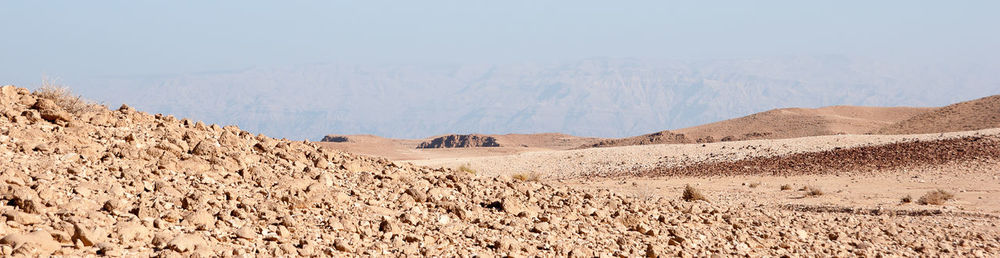 Panoramic view of desert against sky