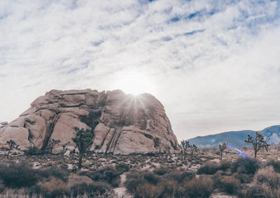 Scenic view of rocky mountains against sky