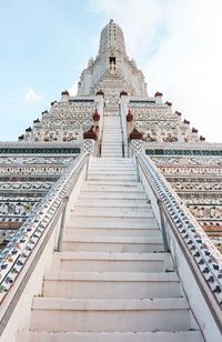 Low angle view of staircase of building against sky