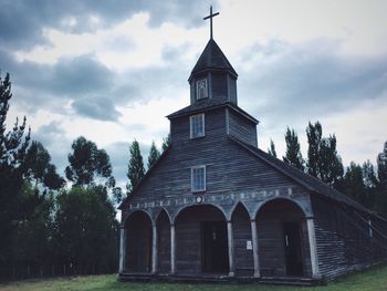 Low angle view of church against sky