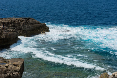 Powerful waves crushing on a rocky beach. rocky coastline and sea