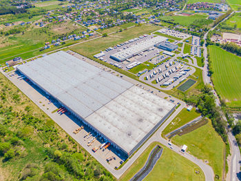 Aerial view of warehouse storages or industrial factory or logistics center from above. top view 