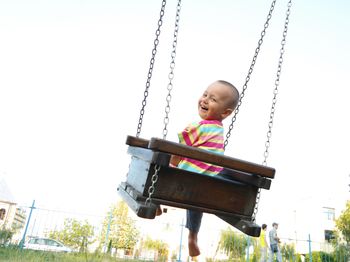 Boy playing in playground