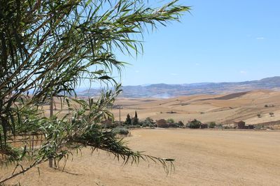 Scenic view of desert against sky