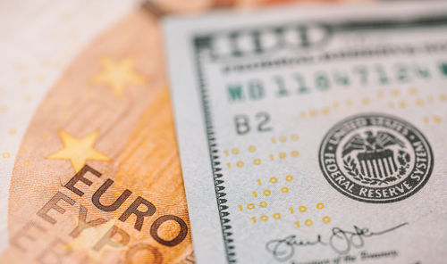 Close-up of coins on paper