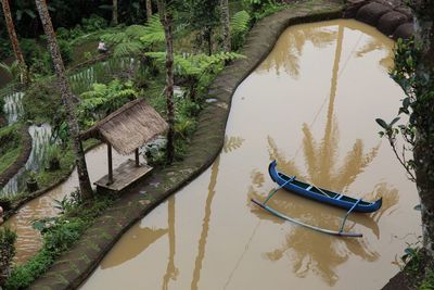 High angle view of boats moored in lake