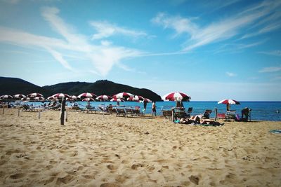 Scenic view of sandy beach against sky