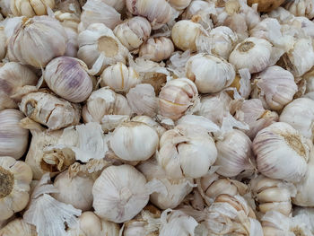 Full frame shot of onions for sale at market