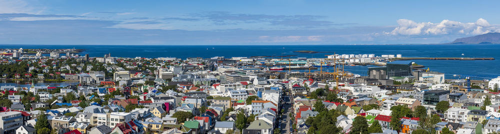 High angle view of city against sea