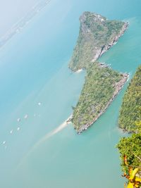 High angle view of bay against clear blue sky